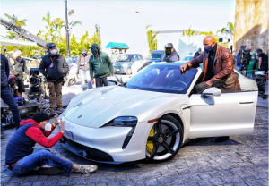 Dwayne Johnson too big to fit in a Porche Taycan