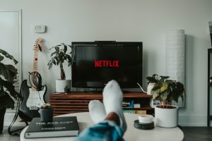A man watching Netflix on TV.