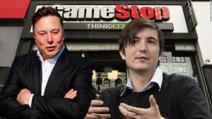 CEO of Tesla Elon Musk and CEO of Robinhood Vladimir Tenev, GameStop sign in the background