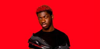 Lil Nas X with pair of Satanic Shoes by MSCHF