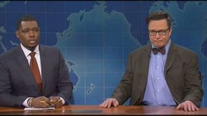 Elon Musk), right, appeared on Saturday Night Live in the guise of ‘financial expert’ Lloyd Ostertag © NBC (Dogecoin)