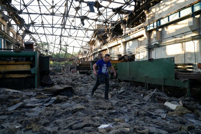 Putin claims attack on tanks, Ukraine says they hit train cars 