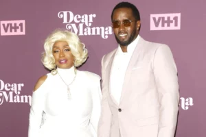 Janice coms and Diddy cobs on red carpet at an event