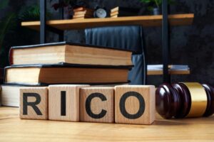 Firms Not Covered in Ford $100M RICO Suit, Insurer Affirms No Coverage Obligation
