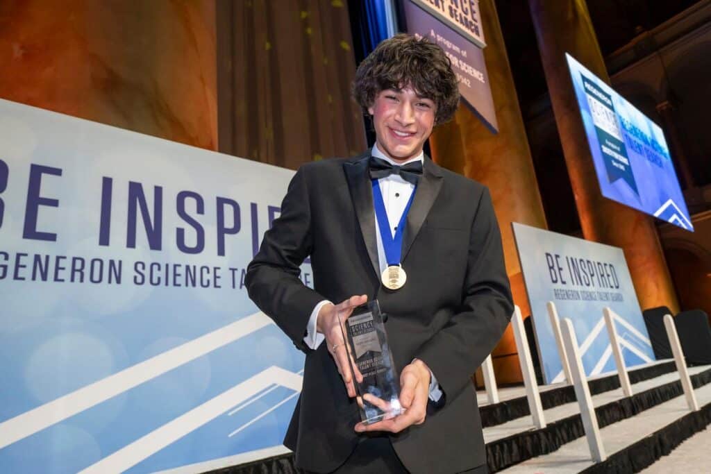 2025-Regeneron-Science-Talent-Search-Winner-Matteo-Paz-Holds-His-Trophy