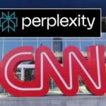 Red, oversized 'CNN' letters sculpture outside a glass-front building with a blue exterior; a black 'perplexity' logo is overlaid above.