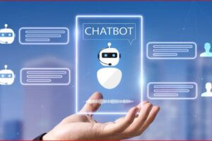 Hand holds a glowing card labeled CHATBOT with a robotic avatar and floating chat bubbles on a blue digital background.
