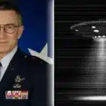 Portrait of a military officer in dress uniform with medals, standing in front of a U.S. flag; a grayscale UFO with beam is shown to the right.