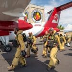 Federal wildland firefighters from the Bureau of Land Management prepare to deploy — three federal firefighters were killed battling wildfires on the Utah-Colorado border on June 28, 2026