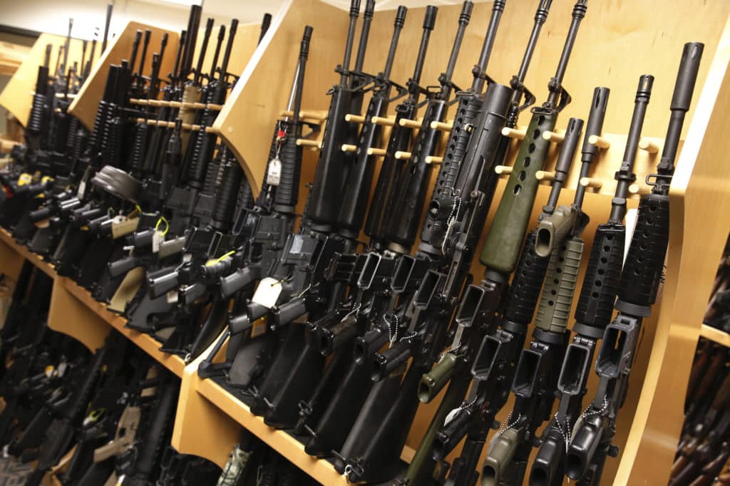 AR-15 rifles line a shelf in the gun library at the ATF National Tracing Center in Martinsburg, West Virginia