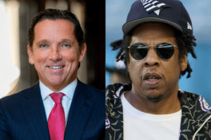 Two men side by side: on the left a smiling businessman in a navy suit and red tie; on the right a rapper wearing sunglasses, a cap, and a patterned jacket.