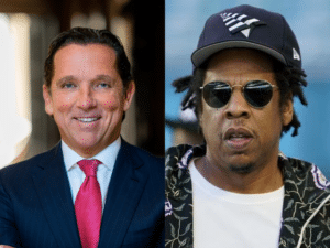 Two men side by side: on the left a smiling businessman in a navy suit and red tie; on the right a rapper wearing sunglasses, a cap, and a patterned jacket.