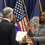 Federal Reserve Governor Lisa Cook takes the oath of office in May 2022. On June 29, 2026, the Supreme Court voted 5-4 to block President Trump's attempt to remove her from the position.