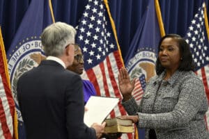Federal Reserve Governor Lisa Cook takes the oath of office in May 2022. On June 29, 2026, the Supreme Court voted 5-4 to block President Trump's attempt to remove her from the position.
