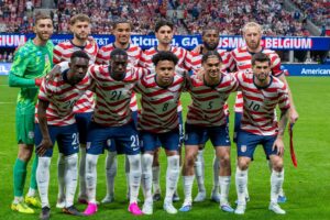 USMNT starting eleven lined up before a 2026 international match, wearing their red and white uniforms at Mercedes-Benz Stadium in Atlanta, Georgia