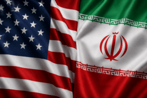 Two national flags side by side: the United States with stars and stripes and Iran with its green-white-red stripes and emblem