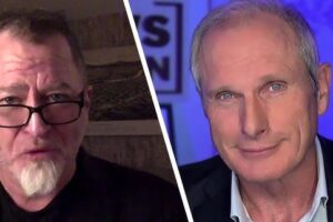 Split-screen image of two men: left appears in a casual setting with glasses and a goatee; right in a studio with blue lighting and blazer, suggesting an interview or discussion.
