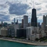 Chicago skyline along Lake Michigan with the John Hancock Center visible by the waterfront