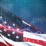U.S. flag waving overlaid with digital stock market charts and candlesticks.