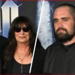 Three people posing for a photo: an older man with a white beard and cap on the left, a woman in sunglasses in the middle, and a bearded man in a black hoodie on the right, split by a diagonal line in the backdrop.