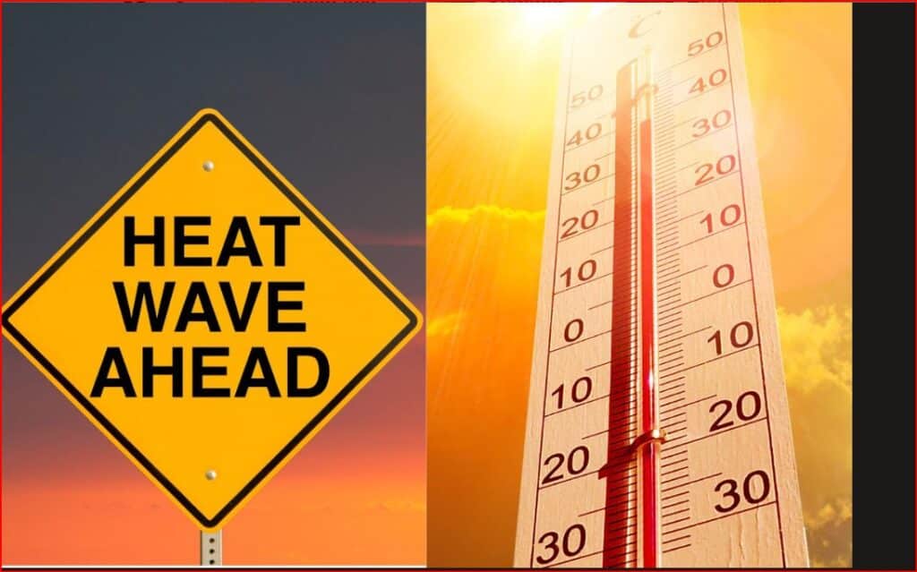Yellow warning diamond sign reading 'HEAT WAVE AHEAD' beside a bright thermometer under a sunset sky, signaling extreme heat.