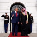 President Donald Trump speaks with Saudi Crown Prince Mohammed bin Salman at the White House.