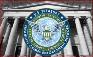FinCEN seal (U.S. Financial Crimes Enforcement Network) over a neoclassical government building with columns.