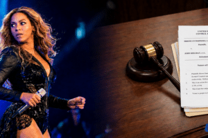 Female singer performing on stage, holding a microphone, with a judge's gavel and legal documents visible on a desk to the right.