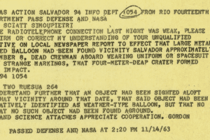 Typed memo on yellowed paper with a USA Herald logo, about a 1963 sighting of a weather-type balloon near Salvador, dated Nov 14, 1963.