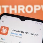 Phone screen showing the Claude by Anthropic app page in an app store, with an orange background that reads ANTHROPIC.
