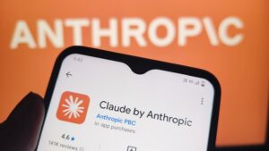 Phone screen showing the Claude by Anthropic app page in an app store, with an orange background that reads ANTHROPIC.