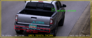 Rear view of a grey Toyota Tacoma with a back rack and Raiders sticker; license plate 47MP04; timestamp and coordinates overlaid on image.