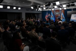 Reporters attend a Pentagon press briefing led by Pete Hegseth in June 2025.