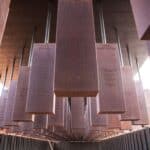Rows of suspended steel monuments at the National Memorial for Peace and Justice in Montgomery, Alabama.