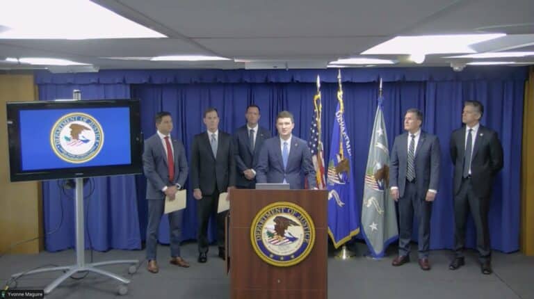 Trent McCotter speaks at a DOJ news conference about California ballots and election-related charges.