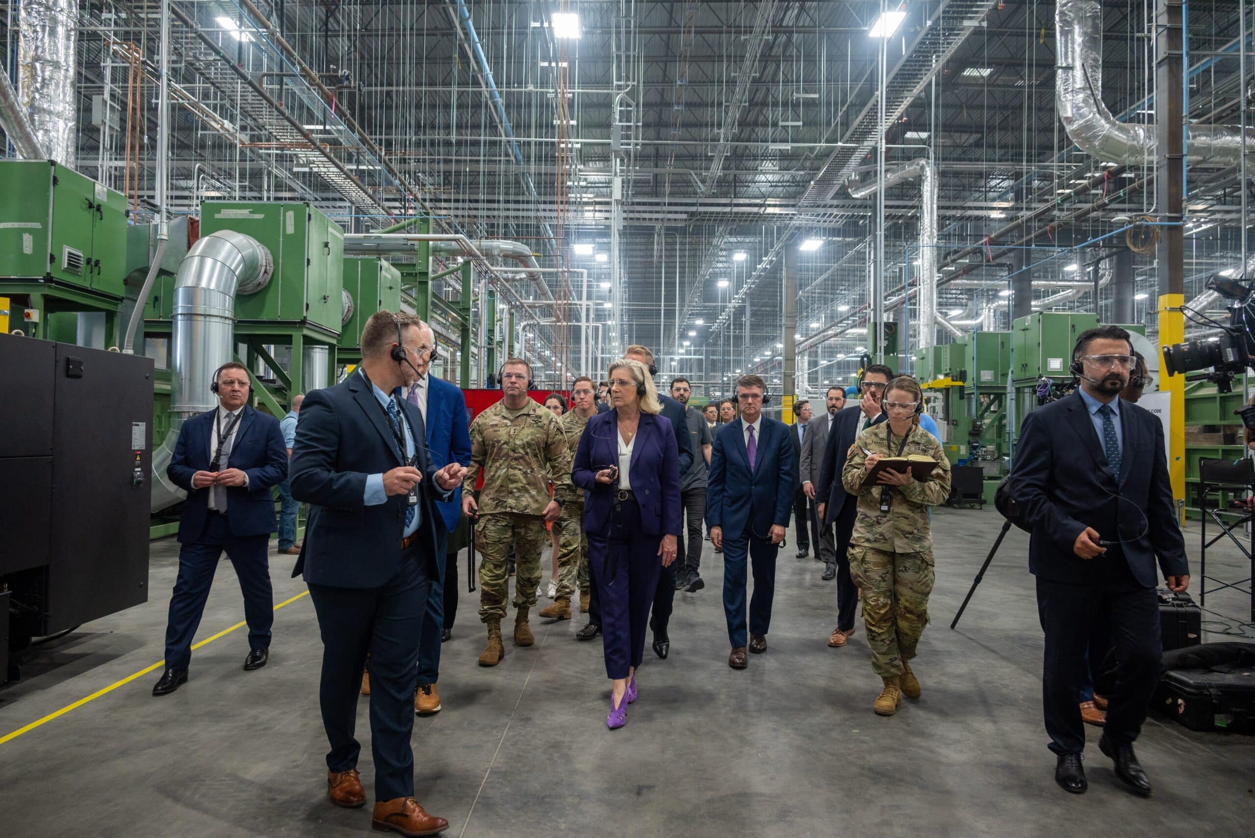 Then-Army Secretary Christine Wormuth tours the Mesquite shell plant with officials on May 29, 2024.